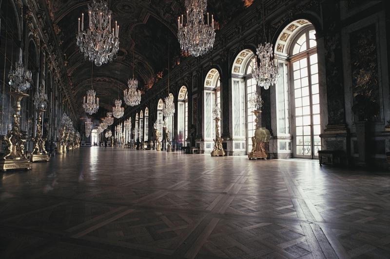 Visit the ornate halls of Versailles on a guided tour